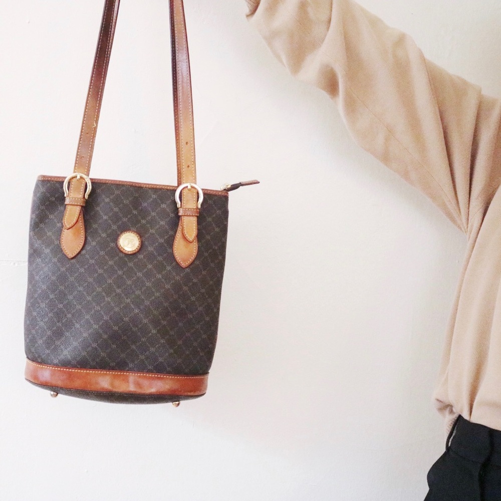 Brown leather print bucket bag